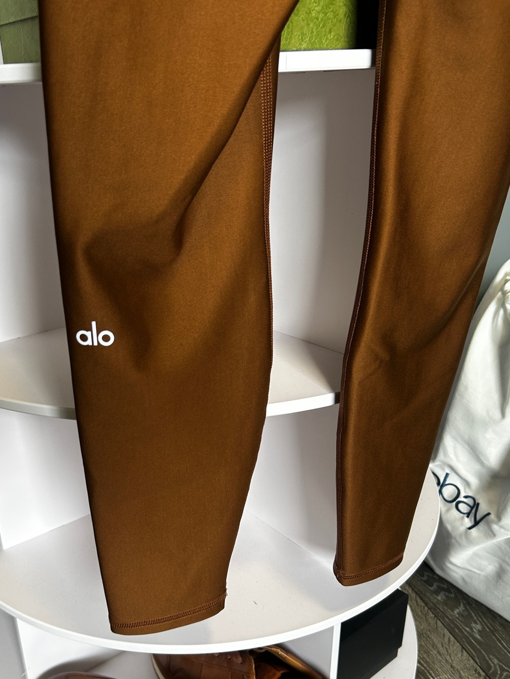 Alo Airlift Leggings in a Copper brown color - Picture 3 of 7